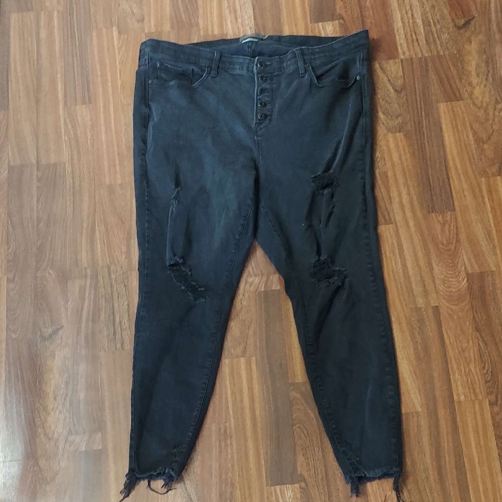 Torrid Black Distressed Skinny Jeans with Sleek Design
